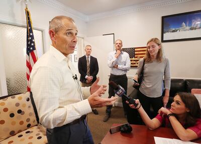 Rep. John Curtis, R-Utah, speaks with members of the media in Provo on Friday, Sept. 21, 2018, after he meet with a group of mayors, county commissioners and state representatives about the Pole Creek and Bald Mountain fires.