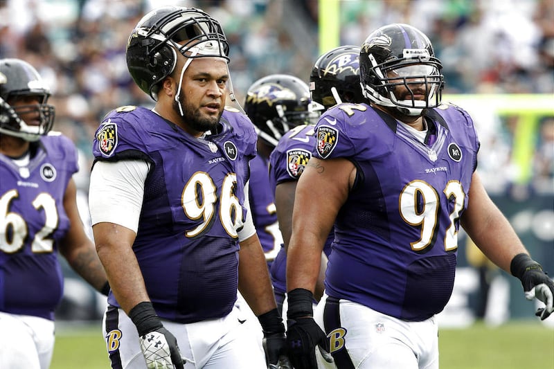 Baltimore nose tackle Maake Kemoeatu (96) lost more than 70 pounds to get back into playing shape after taking a year off.