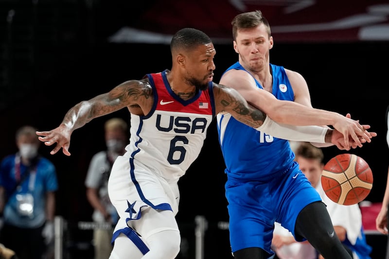 United States’s Damian Lillard steals the ball from Czech Republic’s Martin Peterka