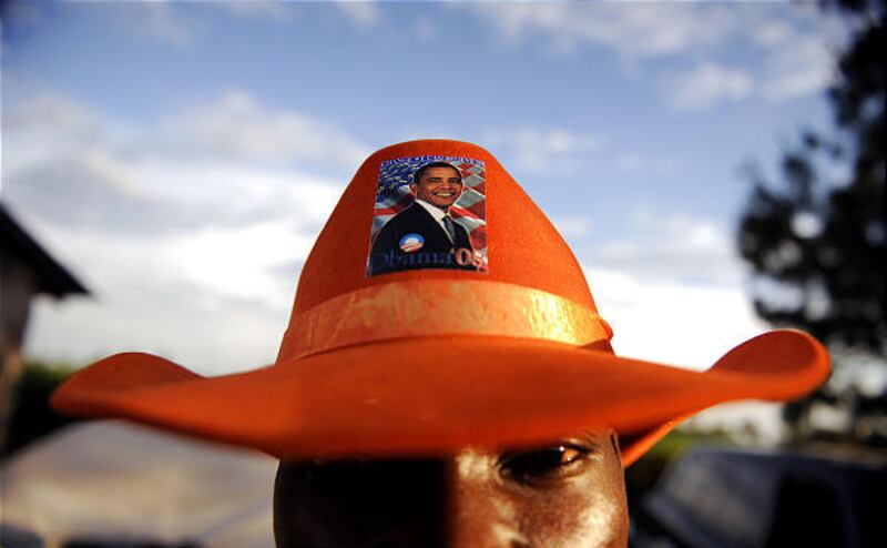 A supporter of Barack Obama sports a hat bearing a sticker of the Democratic presidential hopeful in the Kenyan village of Kogelo on Tuesday.