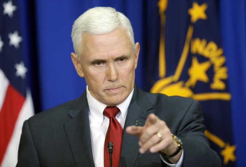 Indiana Gov. Mike Pence takes a question during a news conference, Tuesday, March 31, 2015, in Indianapolis.