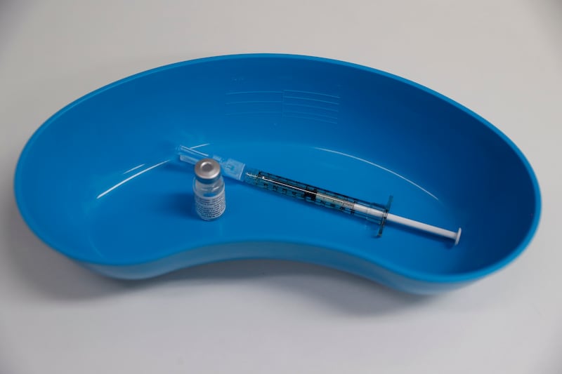 A dose of the Phase 3 Novavax coronavirus vaccine is seen ready for use in the trial at St. George’s University hospital in London Wednesday, Oct. 7, 2020.