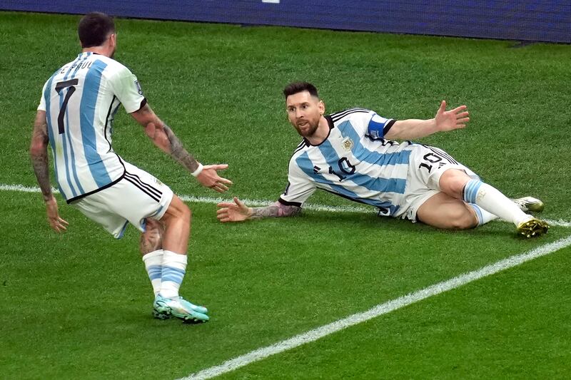 Argentina’s Lionel Messi celebrates scoring his side’s opening goal during the World Cup final between Argentina and France on Dec. 18, 2022.