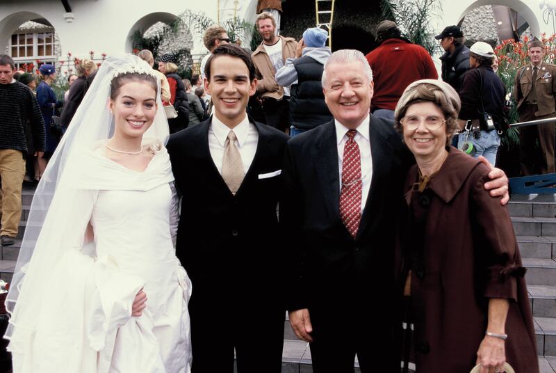 Left, actors Anne Hathaway and Christopher Gorham stand next to Elder John H. Groberg and his wife Jean on the set of "The Other Side of Heaven" in New Zealand. Gorham will return as President Groberg, a mission president for the Tonga-Fiji mission in "Th