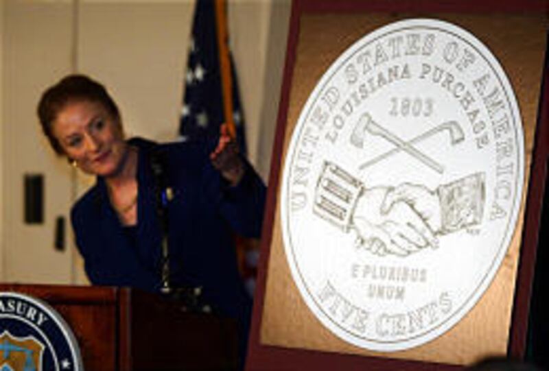 Mint Director Henrietta Holsman Fore unveils the new design of the nickel. It will be released next spring.