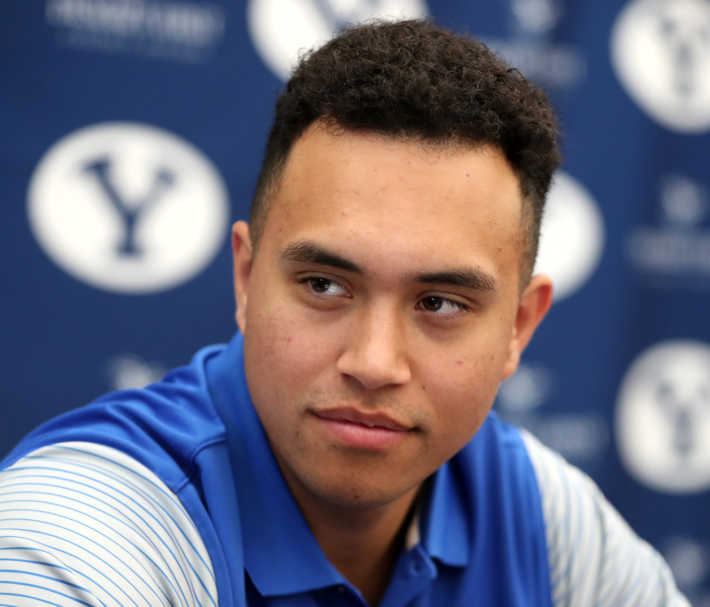 BYU tight end Moroni Laulu-Pututau talks with media members during the BYU football media day in the BYU Broadcasting Building no the BYU campus in Provo on Friday, June 22, 2018.
