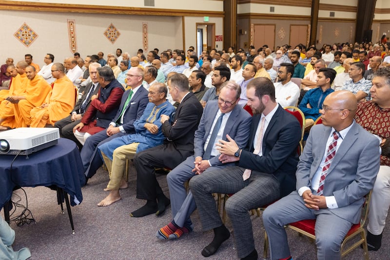 People gather for the grand opening ceremony of the BAPS new mandir in Utah on Sept. 13, 2025.