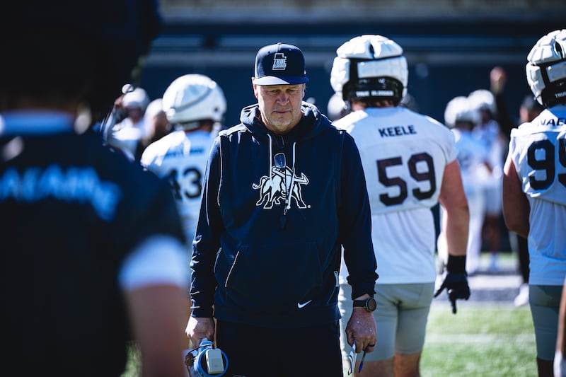 Utah State head coach Bronco Mendenhall looks on during spring camp in Logan.