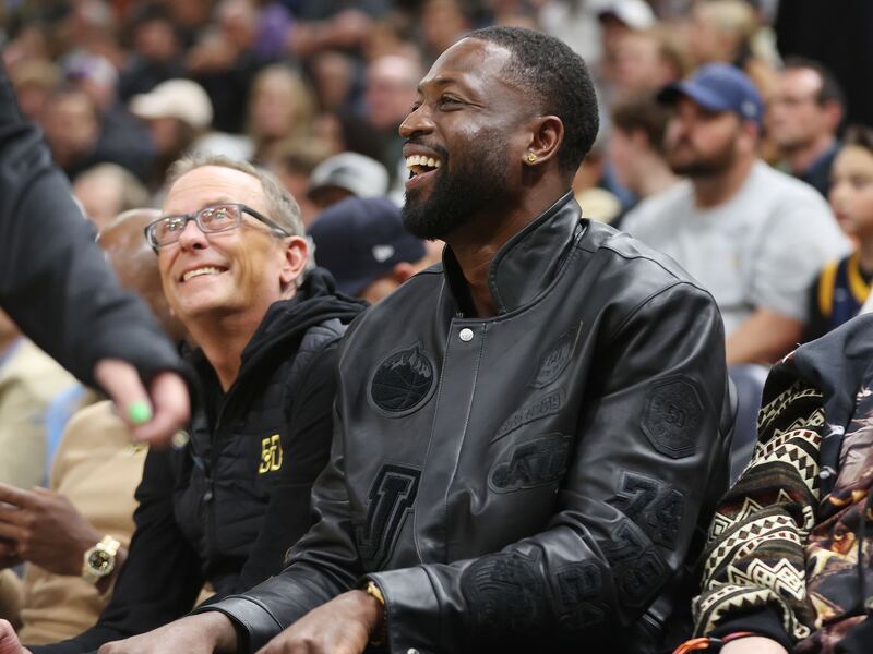 Utah Jazz owner Dwyane Wade watches the game.