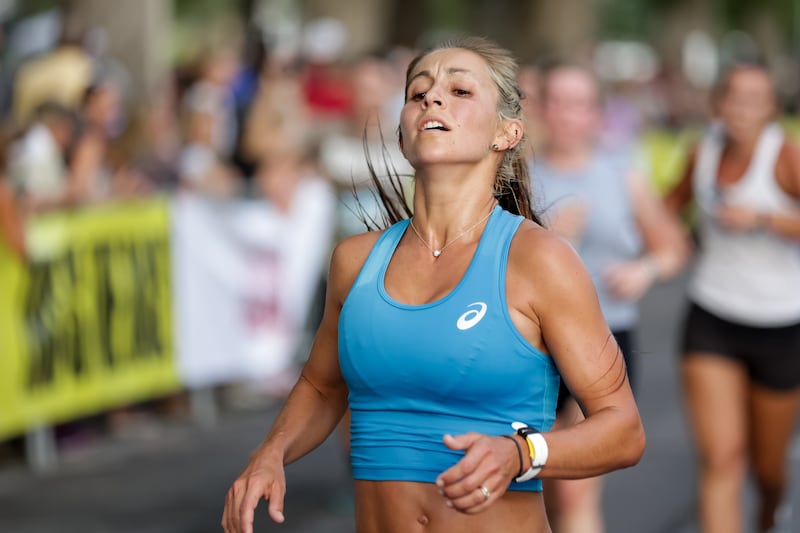 Makenna Myler places first in the women’s division of the Deseret News Half Marathon at Liberty Park in Salt Lake City