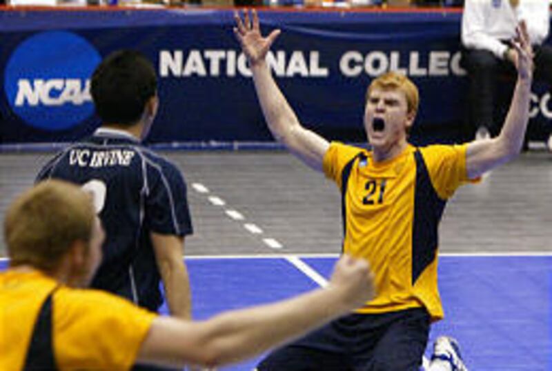 UC Irvine's Aaron Harrell celebrates the Anteaters' NCAA volleyball championship after their victory over the IPFW Mastodons Saturday.