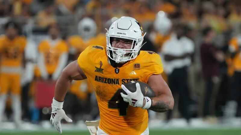 Arizona State running back Cam Skattebo carries the ball during game against Mississippi State, Saturday, Sept. 7, 2024, in Tempe, Ariz.