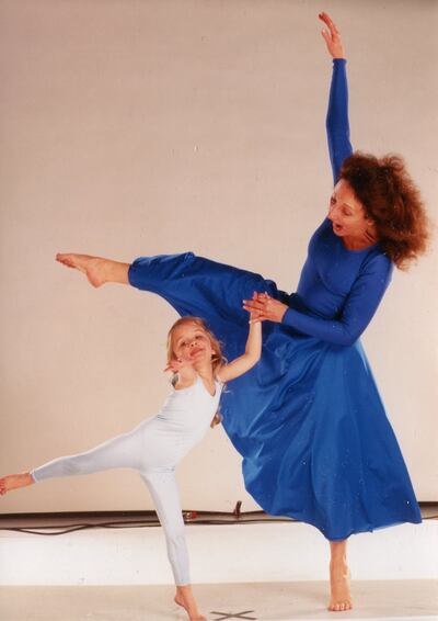Mary Ann Lee, director of Tanner Dance Program, dances with a young student. The organization celebrates 70 years this season.