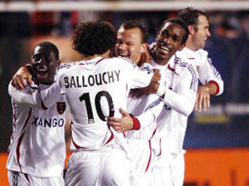 Real Salt Lake's Chris Brown, third from left, celebrates his tying goal against the NewYork Red Bulls.