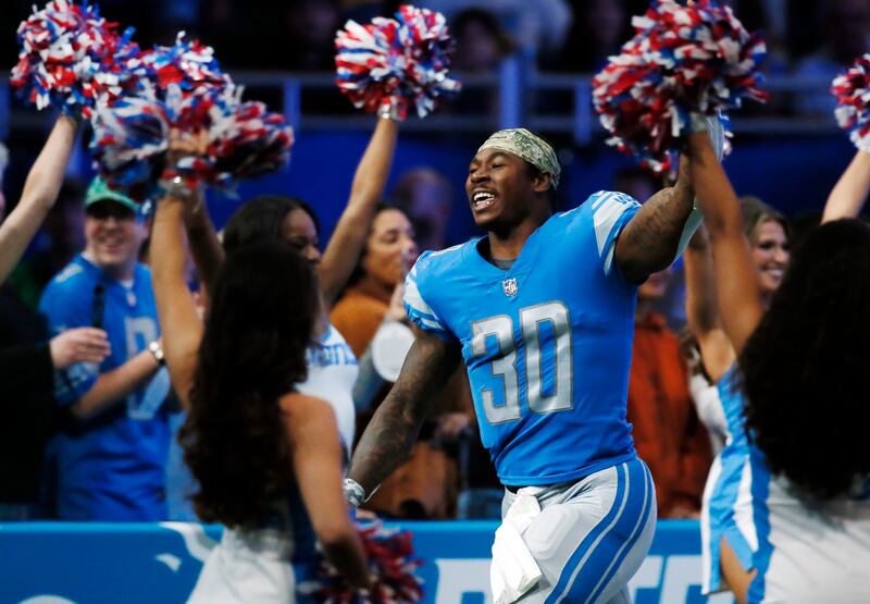 Detroit Lions running back Jamaal Williams (30) is introduced before an NFL football game against the Green Bay Packers Sunday, Nov. 6, 2022, in Detroit.