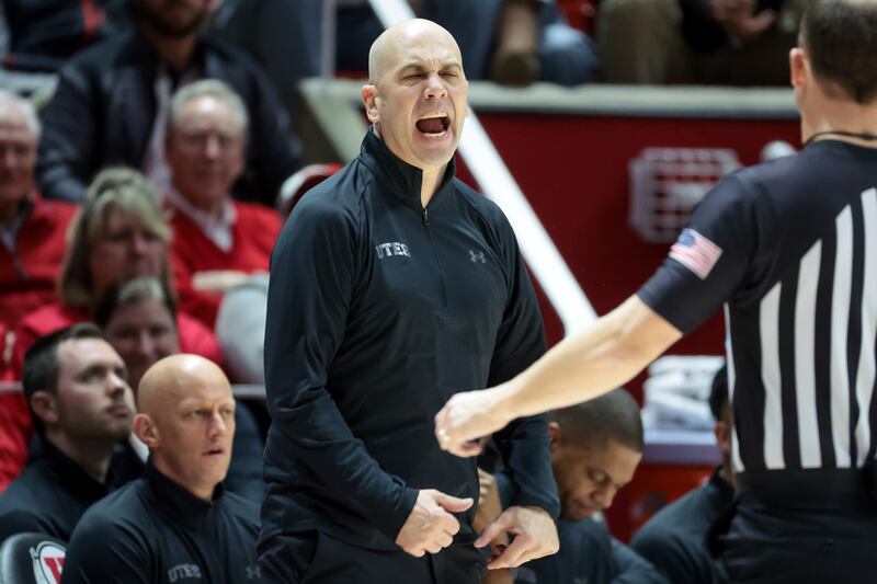Utah Utes head coach Craig Smith reacts to a foul call