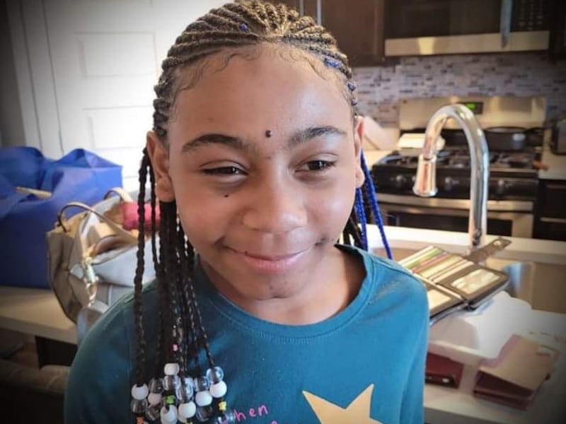 A family photo shows Isabella “Izzy” Tichenor, who at 10 years old died by suicide.