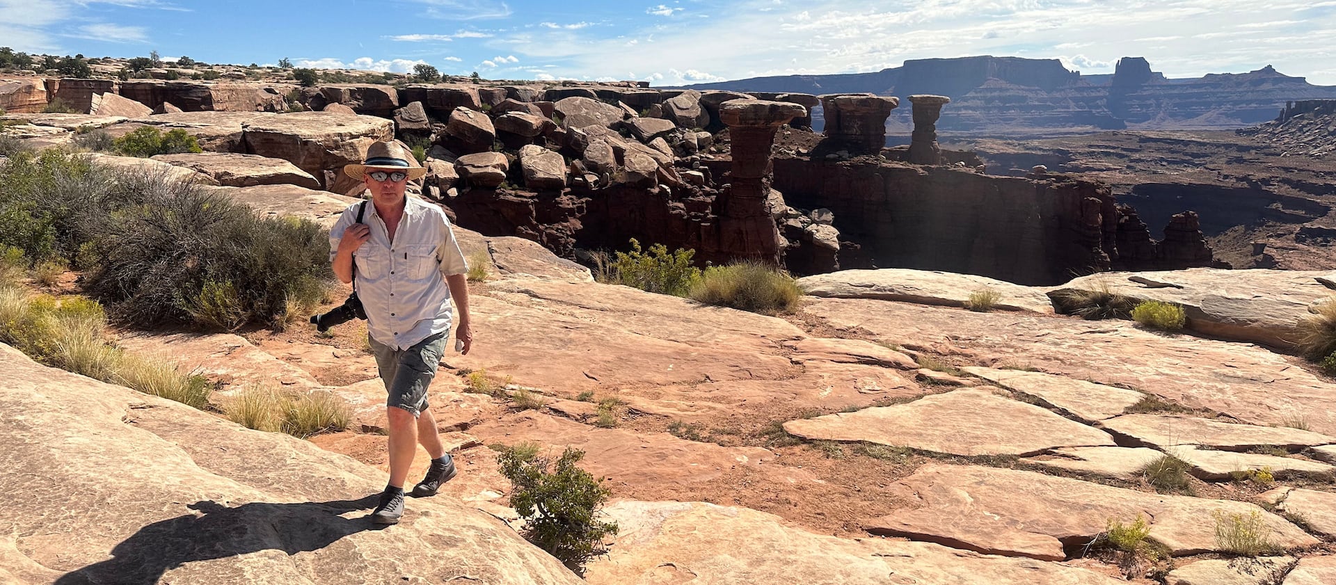 Gary McKellar walks along the White Rim Trail in Moab, Utah.