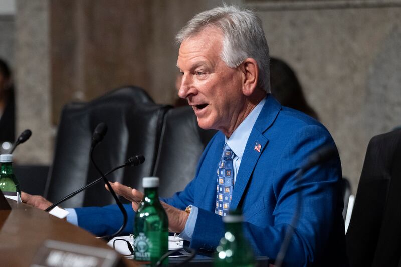 Sen. Tommy Tuberville, R-Ala., questions Navy Adm. Lisa Franchetti during a Senate Armed Services Committee hearing on Capitol Hill in Washington.