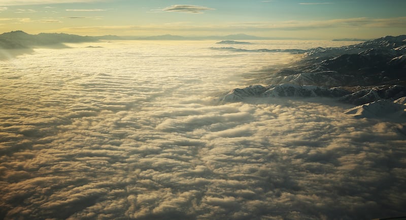 The sun rises over the smog-filled Salt Lake Valley on Monday, Jan. 14, 2019.