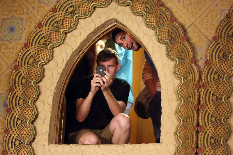 Two men look down into the Moorish Room while touring the Salt Lake Masonic Temple in Salt Lake City on May 2, 2015.