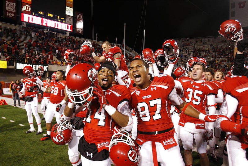 Players celebrate as the University of Utah defeats UCLA 31-6 Saturday, Nov. 12, 2011, in Salt Lake City, Utah.