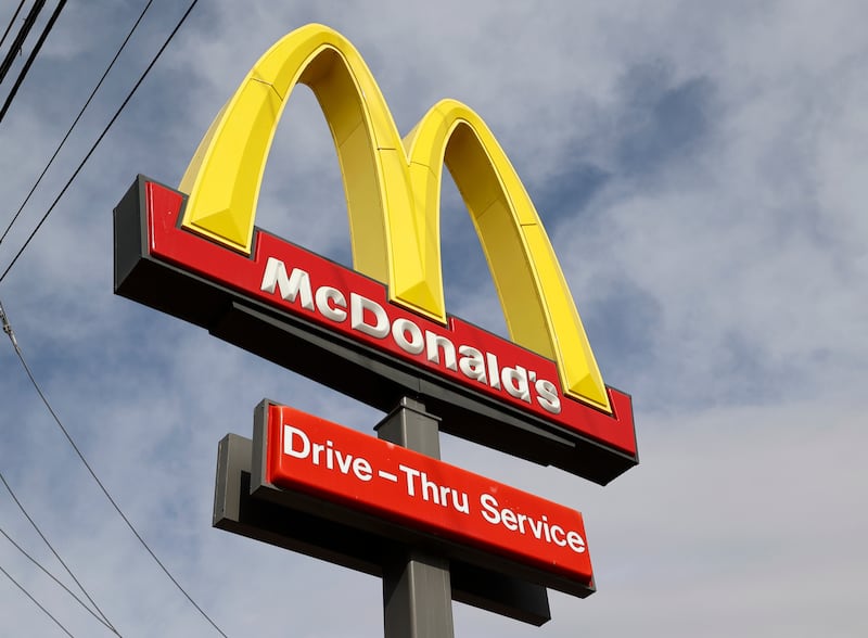 A high-rise McDonald’s sign.