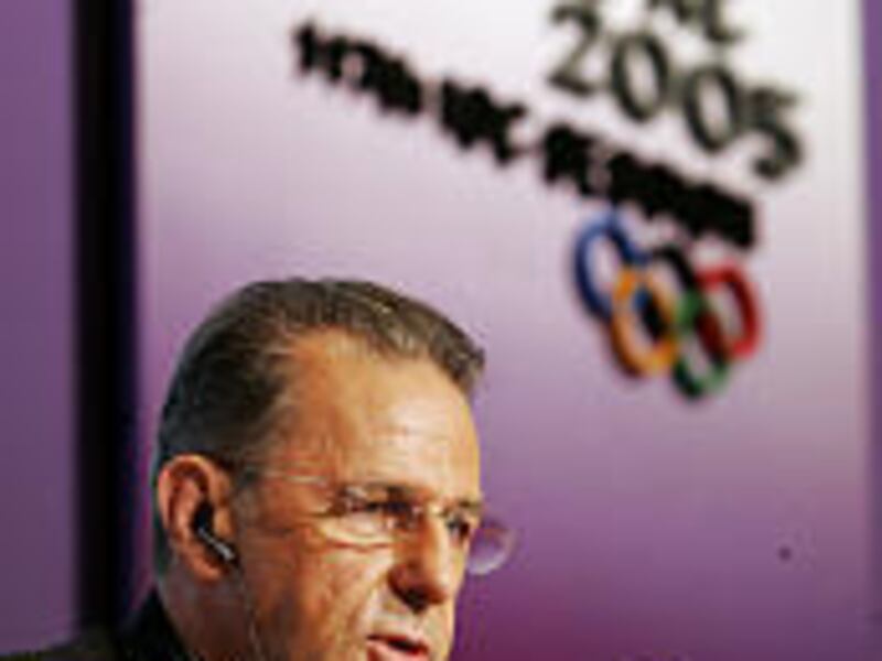 IOC President Jacques Rogge speaks at press conference.