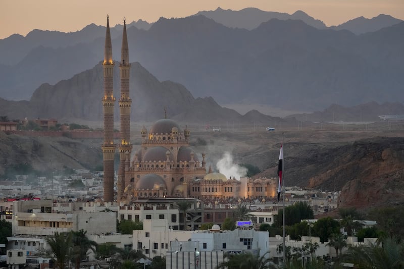 The sun sets over Al Sahaba mosque in the old market in Sharm el-Sheikh, Egypt, Friday, Nov. 4, 2022. Sharm el-Sheikh will host the COP27 U.N. Climate Summit starting on Nov. 6, and is scheduled to end on Nov. 18.