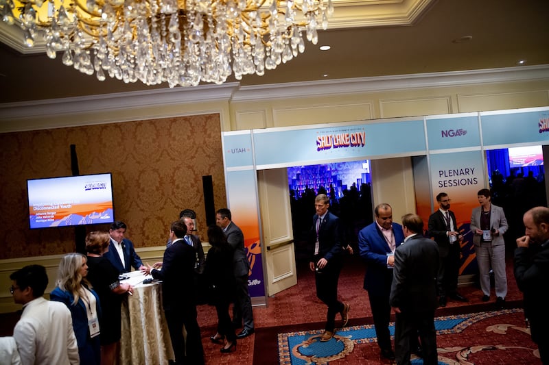 People gather for the National Governors Association summer meeting at the Grand America Hotel in Salt Lake City on Thursday, July 25, 2019.