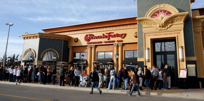 Patrons line up outside the Cheesecake Factory in Murray as the restaurant opens its doors for business on Nov. 1, 2007.