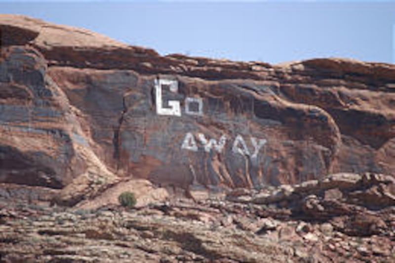 A new message appears next to the letter "G" after someone added some letters to make the phrase "Go away" on the cliff face visible from Moab.