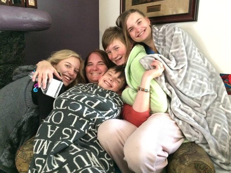 Stacey Kratz enjoys some attention from her children on Mother's Day 2015. I often write about my family and the work-life balance lessons I learn from them. In reality, though, I'm not the only person in my family who is trying to build a balanced life.