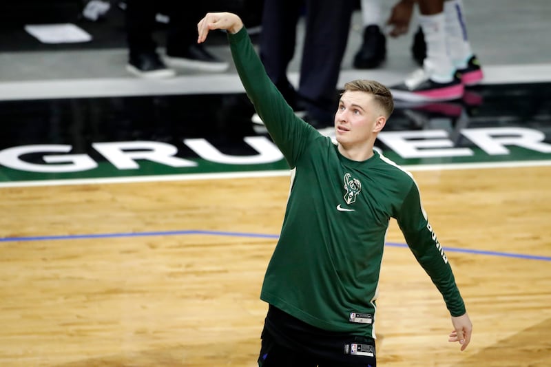 Milwaukee Bucks’ Sam Merrill warms up.