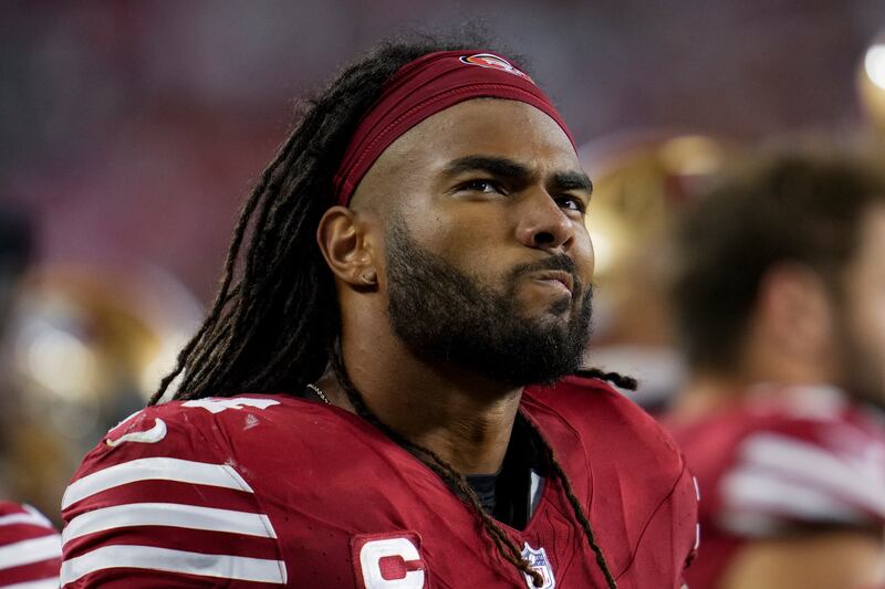 San Francisco 49ers linebacker Fred Warner watches from the sideline during the second half of an NFL football game against the Dallas Cowboys.