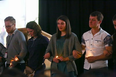 Family, friends and colleagues gather for a candlelight vigil in memory of Dr. Sarah Hawley at the University of Utah Guest House in Salt Lake City on Monday, Feb. 4, 2019. Hawley was killed by her boyfriend in what police believe to be a murder-suicide o