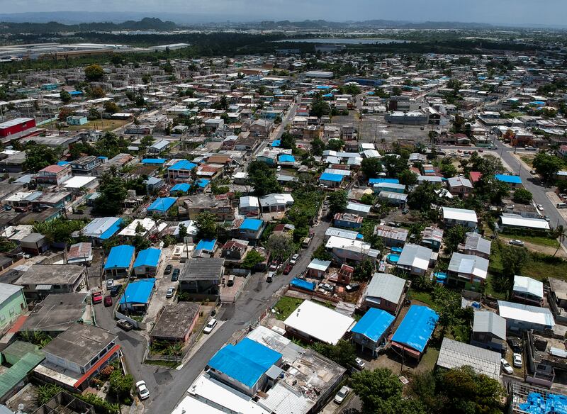 This June 18, 2018, file photo shows an aerial view of the Amelia neighborhood in the municipality of Catano, east of San Juan, Puerto Rico. A long-delayed disaster aid bill that’s a top political priority for some of President Donald Trump’s GOP allies i