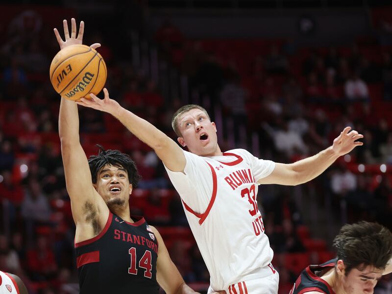 Utah Utes guard Eli Ballstaedt (32) has his shot blocked by Stanford forward Spencer Jones in Salt Lake City on Thursday, Feb. 2, 2023.