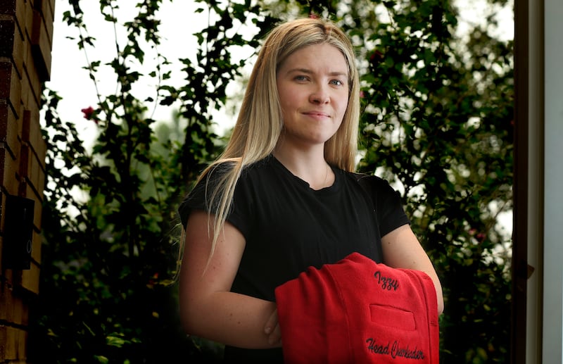 Izzy Johnston, a former West High School and Boise State University cheerleader, is photographed in Centerville.