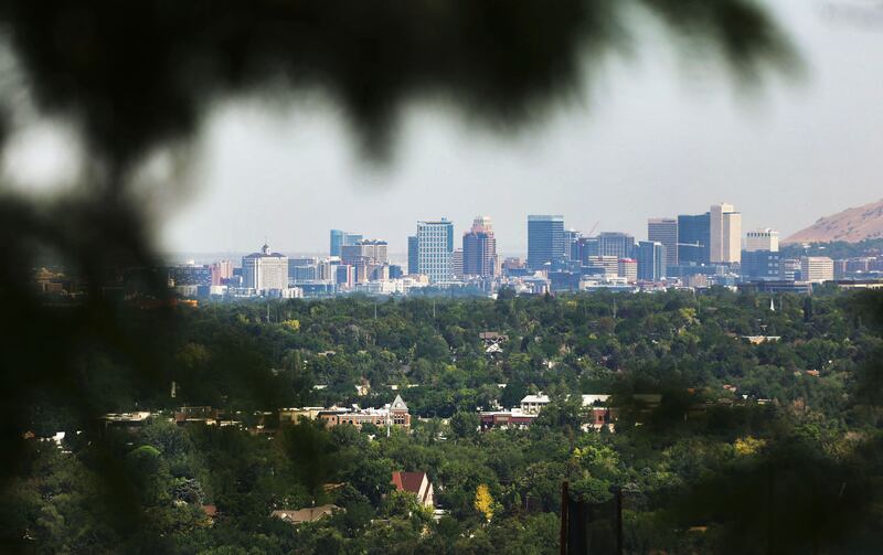 The Salt Lake City skyline and homes in Salt Lake County are pictured on Wednesday, July 13, 2022.