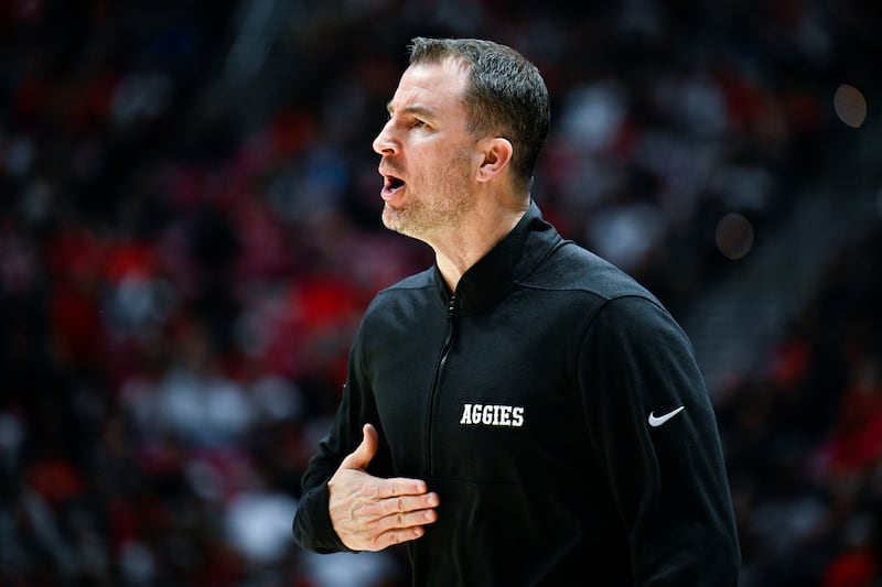 Utah State coach Danny Sprinkle yells from the sideline during game against San Diego State, Feb. 3, 2024, in San Diego.
