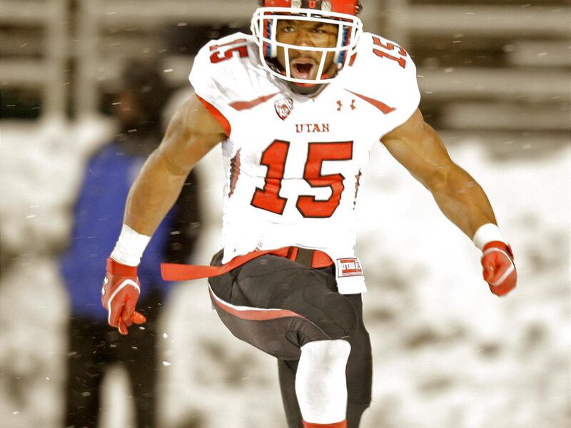 Utah running back John White IV celebrates after scoring on a 56-yard sideline scamper during the second half of Saturday's game against Washington State. White ran for 186 yards and two touchdowns.