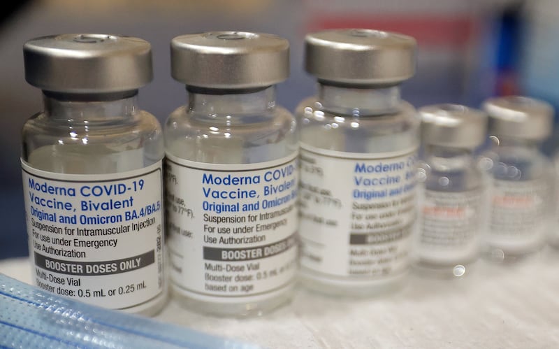 Vials of the Moderna and Pfizer COVID-19 bivalent booster are pictured at the Sanderson Community Center in Taylorsville.