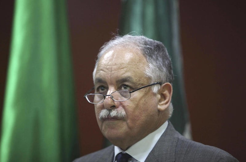 FILE - In this July 26, 2011 file photo taken on a government-organized tour, Libyan Prime Minister Al-Baghdadi al-Mahmoudi talks at a press conference in Tripoli, Libya. Tunisia said Tuesday, May 22, 2012 it will soon extradite Al-Baghdadi Al-Mahmoudi ba