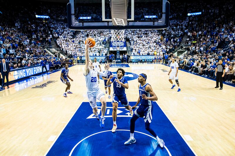 BYU's Spencer Johnson goes in for a layup during game against Kansas State in the Marriott Center in Provo.