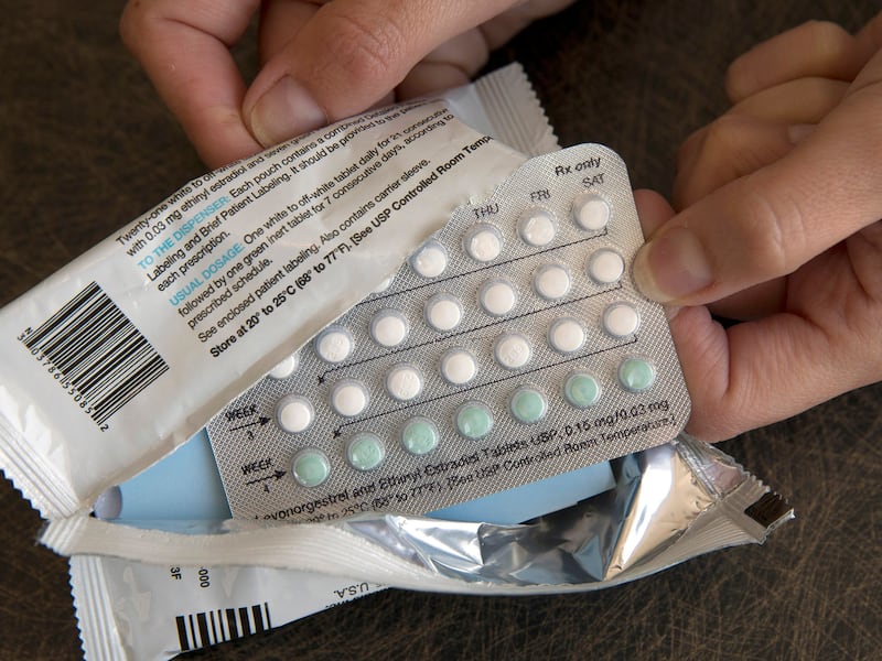 FILE - In this Aug. 26, 2016, file photo, a one-month dosage of hormonal birth control pills is displayed in Sacramento, Calif. A U.S. judge will hear arguments over California’s attempt to block new rules by the Trump administration allowing more employe