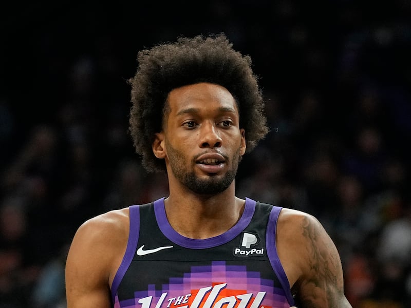 Phoenix Suns forward Paris Bass, wearing black