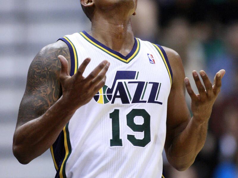 Utah Jazz shooting guard Raja Bell (19) reacts after battling with Minnesota Timberwolves point guard Ricky Rubio (9) for a lose ball as the Utah Jazz and the Minnesota Timberwolves play Saturday, Jan. 21, 2012 in Energy Solutions arena in Salt Lake City.