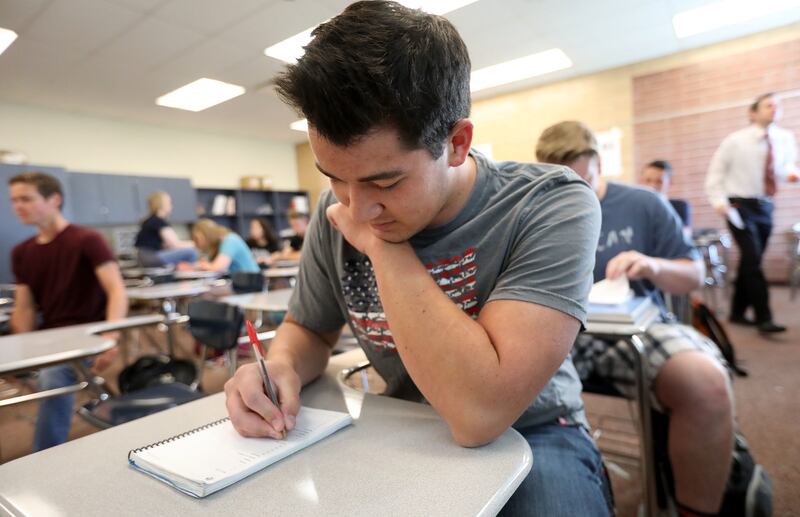 Ethan Moser participates in a Positive in the Present exercise, which includes writing down three things to be grateful for, during first period at Salem Hills High School in Salem on Thursday, May 24, 2018.