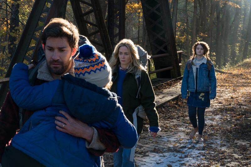 Left to right: Noah Jupe plays Marcus Abbott, John Krasinski plays Lee Abbott, Emily Blunt plays Evelyn Abbott and Millicent Simmonds plays Regan Abbott in A QUIET PLACE, from Paramount Pictures.